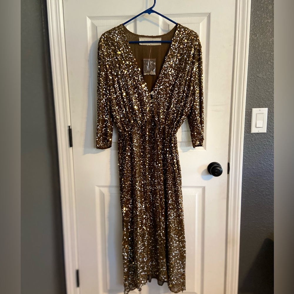 Jen’s Pirate Booty sequin dress. Brand new never been worn in a smoke free home.